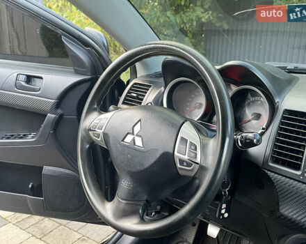 Чорний Міцубісі Lancer, об'ємом двигуна 2 л та пробігом 300 тис. км за 4600 $, фото 18 на Automoto.ua
