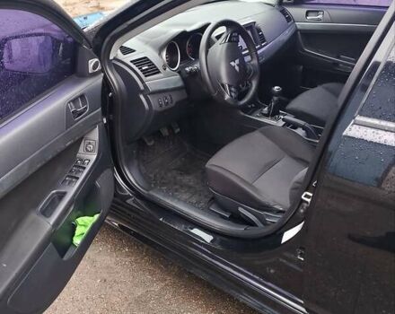 Чорний Міцубісі Lancer, об'ємом двигуна 2 л та пробігом 210 тис. км за 7100 $, фото 4 на Automoto.ua
