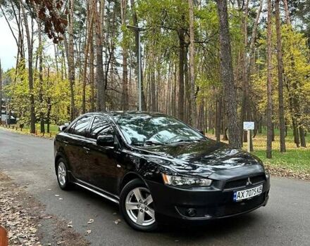 Черный Мицубиси Лансер, объемом двигателя 2 л и пробегом 216 тыс. км за 5600 $, фото 2 на Automoto.ua