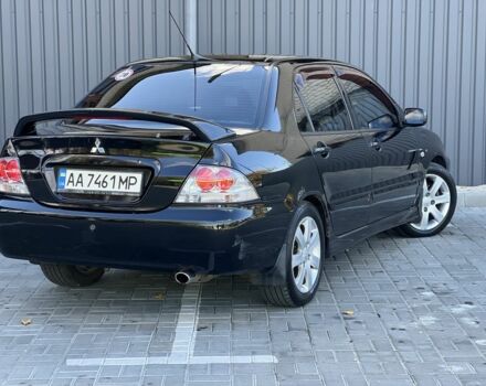 Міцубісі Lancer 2008 у Синельниковом на Automoto.ua Чорний Міцубісі Lancer, об'ємом двигуна 1.6 л та пробігом 230 тис. км за 4500 $, фото 8 на Automoto.ua