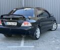 Міцубісі Lancer 2008 у Синельниковом на Automoto.ua Чорний Міцубісі Lancer, об'ємом двигуна 1.6 л та пробігом 230 тис. км за 4500 $, фото 8 на Automoto.ua