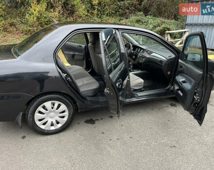 Чорний Міцубісі Lancer, об'ємом двигуна 1.58 л та пробігом 192 тис. км за 4500 $, фото 9 на Automoto.ua