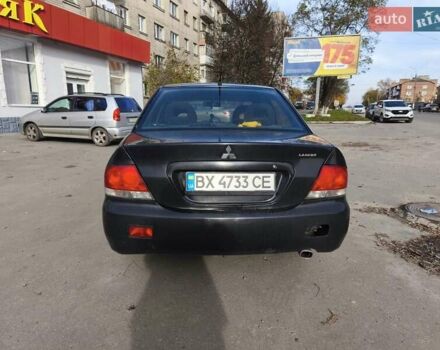 Черный Мицубиси Лансер, объемом двигателя 1.6 л и пробегом 358 тыс. км за 4300 $, фото 2 на Automoto.ua
