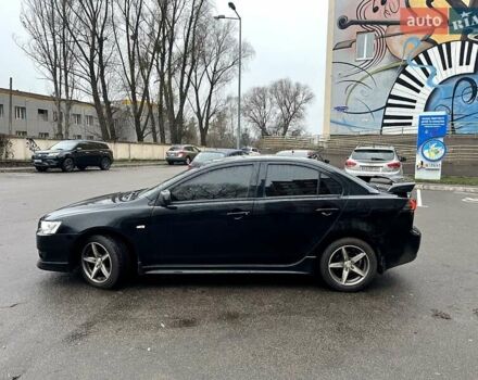 Черный Мицубиси Лансер, объемом двигателя 2 л и пробегом 217 тыс. км за 7000 $, фото 21 на Automoto.ua