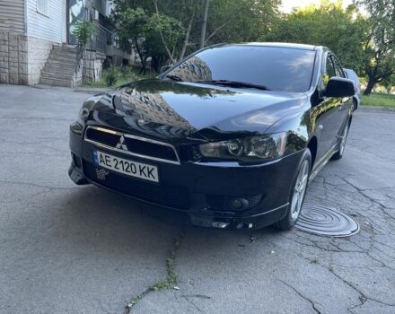 Чорний Міцубісі Lancer, об'ємом двигуна 2 л та пробігом 215 тис. км за 7700 $, фото 1 на Automoto.ua