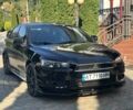 Черный Мицубиси Лансер, объемом двигателя 2 л и пробегом 188 тыс. км за 6900 $, фото 25 на Automoto.ua