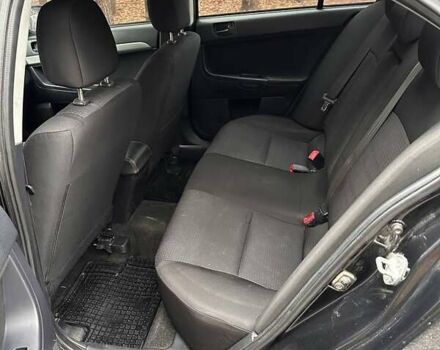 Чорний Міцубісі Lancer, об'ємом двигуна 2 л та пробігом 263 тис. км за 5750 $, фото 8 на Automoto.ua