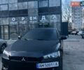 Черный Мицубиси Лансер, объемом двигателя 2 л и пробегом 305 тыс. км за 6500 $, фото 1 на Automoto.ua