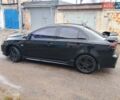 Чорний Міцубісі Lancer, об'ємом двигуна 2 л та пробігом 210 тис. км за 7100 $, фото 1 на Automoto.ua