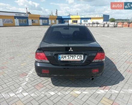Черный Мицубиси Лансер, объемом двигателя 1.58 л и пробегом 267 тыс. км за 3800 $, фото 3 на Automoto.ua