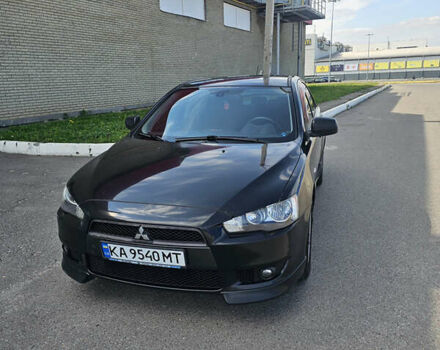 Чорний Міцубісі Lancer, об'ємом двигуна 2 л та пробігом 249 тис. км за 6500 $, фото 2 на Automoto.ua