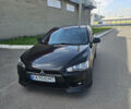 Чорний Міцубісі Lancer, об'ємом двигуна 2 л та пробігом 249 тис. км за 6500 $, фото 2 на Automoto.ua