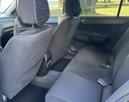 Черный Мицубиси Лансер, объемом двигателя 1.6 л и пробегом 184 тыс. км за 3700 $, фото 7 на Automoto.ua