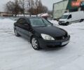 Черный Мицубиси Лансер, объемом двигателя 1.58 л и пробегом 253 тыс. км за 5500 $, фото 1 на Automoto.ua