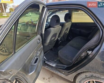 Черный Мицубиси Лансер, объемом двигателя 1.6 л и пробегом 358 тыс. км за 4300 $, фото 6 на Automoto.ua