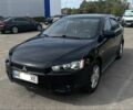Чорний Міцубісі Lancer, об'ємом двигуна 2 л та пробігом 221 тис. км за 6300 $, фото 2 на Automoto.ua
