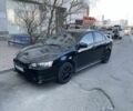 Черный Мицубиси Лансер, объемом двигателя 2 л и пробегом 319 тыс. км за 6800 $, фото 1 на Automoto.ua