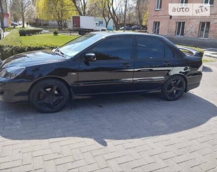 Чорний Міцубісі Lancer, об'ємом двигуна 1.6 л та пробігом 277 тис. км за 4900 $, фото 2 на Automoto.ua