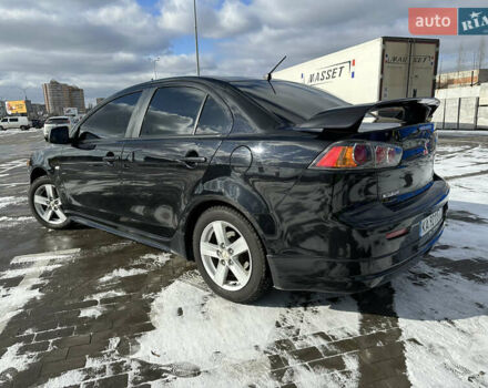 Черный Мицубиси Лансер, объемом двигателя 2 л и пробегом 239 тыс. км за 6500 $, фото 5 на Automoto.ua