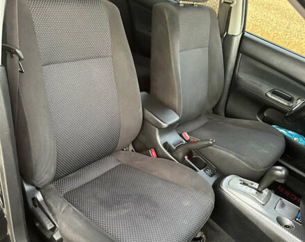 Чорний Міцубісі Lancer, об'ємом двигуна 1.58 л та пробігом 232 тис. км за 4300 $, фото 17 на Automoto.ua