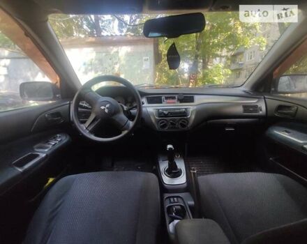 Чорний Міцубісі Lancer, об'ємом двигуна 1.6 л та пробігом 335 тис. км за 3100 $, фото 13 на Automoto.ua