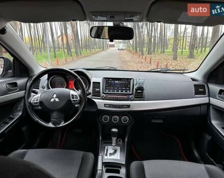 Черный Мицубиси Лансер, объемом двигателя 2 л и пробегом 216 тыс. км за 5600 $, фото 10 на Automoto.ua