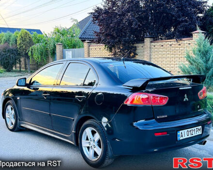 Чорний Міцубісі Lancer, об'ємом двигуна 2 л та пробігом 240 тис. км за 5900 $, фото 5 на Automoto.ua