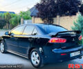 Чорний Міцубісі Lancer, об'ємом двигуна 2 л та пробігом 240 тис. км за 5900 $, фото 5 на Automoto.ua