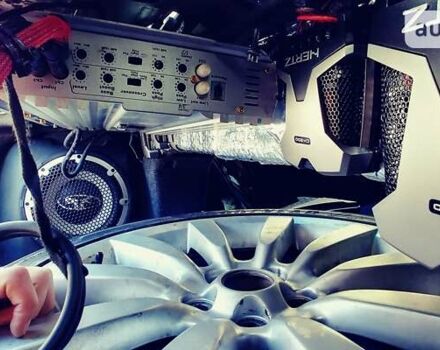 Черный Мицубиси Лансер, объемом двигателя 2 л и пробегом 240 тыс. км за 10000 $, фото 19 на Automoto.ua