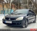 Чорний Міцубісі Lancer, об'ємом двигуна 1.6 л та пробігом 22000 тис. км за 5500 $, фото 1 на Automoto.ua
