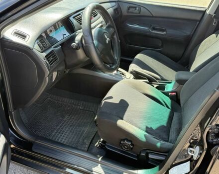Чорний Міцубісі Lancer, об'ємом двигуна 1.6 л та пробігом 217 тис. км за 4600 $, фото 6 на Automoto.ua