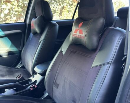 Чорний Міцубісі Lancer, об'ємом двигуна 2 л та пробігом 230 тис. км за 6650 $, фото 20 на Automoto.ua