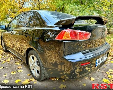 Чорний Міцубісі Lancer, об'ємом двигуна 2 л та пробігом 245 тис. км за 5500 $, фото 4 на Automoto.ua
