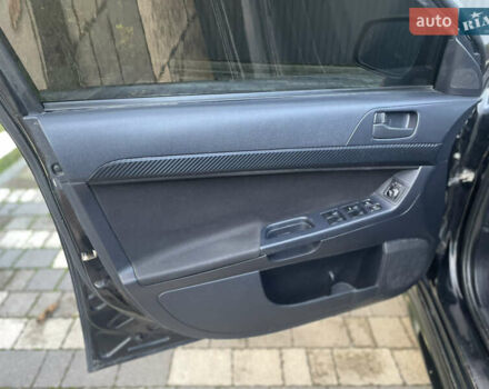 Чорний Міцубісі Lancer, об'ємом двигуна 2 л та пробігом 300 тис. км за 4600 $, фото 13 на Automoto.ua