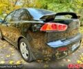 Чорний Міцубісі Lancer, об'ємом двигуна 2 л та пробігом 245 тис. км за 5500 $, фото 4 на Automoto.ua