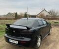 Чорний Міцубісі Lancer, об'ємом двигуна 2 л та пробігом 180 тис. км за 7500 $, фото 1 на Automoto.ua