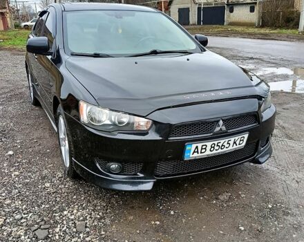 Чорний Міцубісі Lancer, об'ємом двигуна 2 л та пробігом 233 тис. км за 7250 $, фото 1 на Automoto.ua