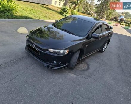 Черный Мицубиси Лансер, объемом двигателя 2 л и пробегом 230 тыс. км за 7000 $, фото 21 на Automoto.ua