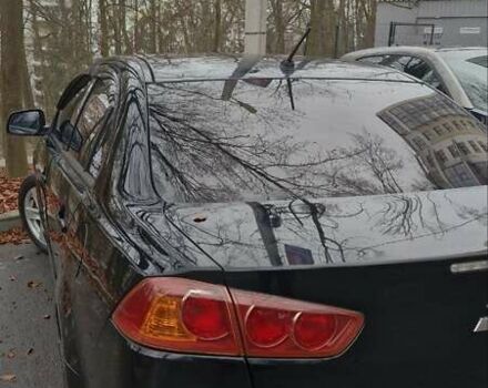 Чорний Міцубісі Lancer, об'ємом двигуна 2 л та пробігом 302 тис. км за 7200 $, фото 1 на Automoto.ua