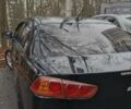 Чорний Міцубісі Lancer, об'ємом двигуна 2 л та пробігом 302 тис. км за 7200 $, фото 1 на Automoto.ua