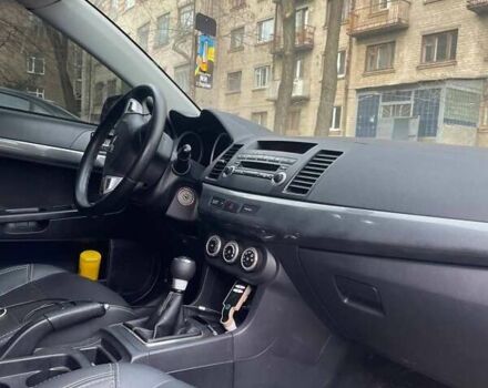 Чорний Міцубісі Lancer, об'ємом двигуна 2 л та пробігом 255 тис. км за 6999 $, фото 4 на Automoto.ua