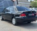 Черный Мицубиси Лансер, объемом двигателя 1.6 л и пробегом 279 тыс. км за 4690 $, фото 6 на Automoto.ua
