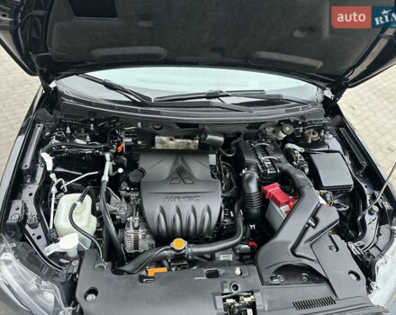 Чорний Міцубісі Lancer, об'ємом двигуна 1.5 л та пробігом 111 тис. км за 6999 $, фото 72 на Automoto.ua