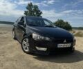Черный Мицубиси Лансер, объемом двигателя 2 л и пробегом 245 тыс. км за 6143 $, фото 1 на Automoto.ua