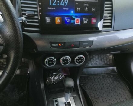 Міцубісі Lancer 2008 у Києві на Automoto.ua Чорний Міцубісі Lancer, об'ємом двигуна 2 л та пробігом 196 тис. км за 5500 $, фото 22 на Automoto.ua