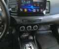 Міцубісі Lancer 2008 у Києві на Automoto.ua Чорний Міцубісі Lancer, об'ємом двигуна 2 л та пробігом 196 тис. км за 5500 $, фото 22 на Automoto.ua