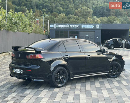 Чорний Міцубісі Lancer, об'ємом двигуна 2 л та пробігом 300 тис. км за 4600 $, фото 10 на Automoto.ua