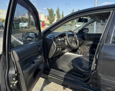 Чорний Міцубісі Lancer, об'ємом двигуна 1.6 л та пробігом 364 тис. км за 3000 $, фото 7 на Automoto.ua