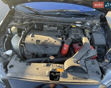 Чорний Міцубісі Lancer, об'ємом двигуна 2 л та пробігом 223 тис. км за 7800 $, фото 15 на Automoto.ua