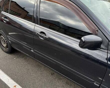 Чорний Міцубісі Lancer, об'ємом двигуна 1.6 л та пробігом 245 тис. км за 4500 $, фото 3 на Automoto.ua